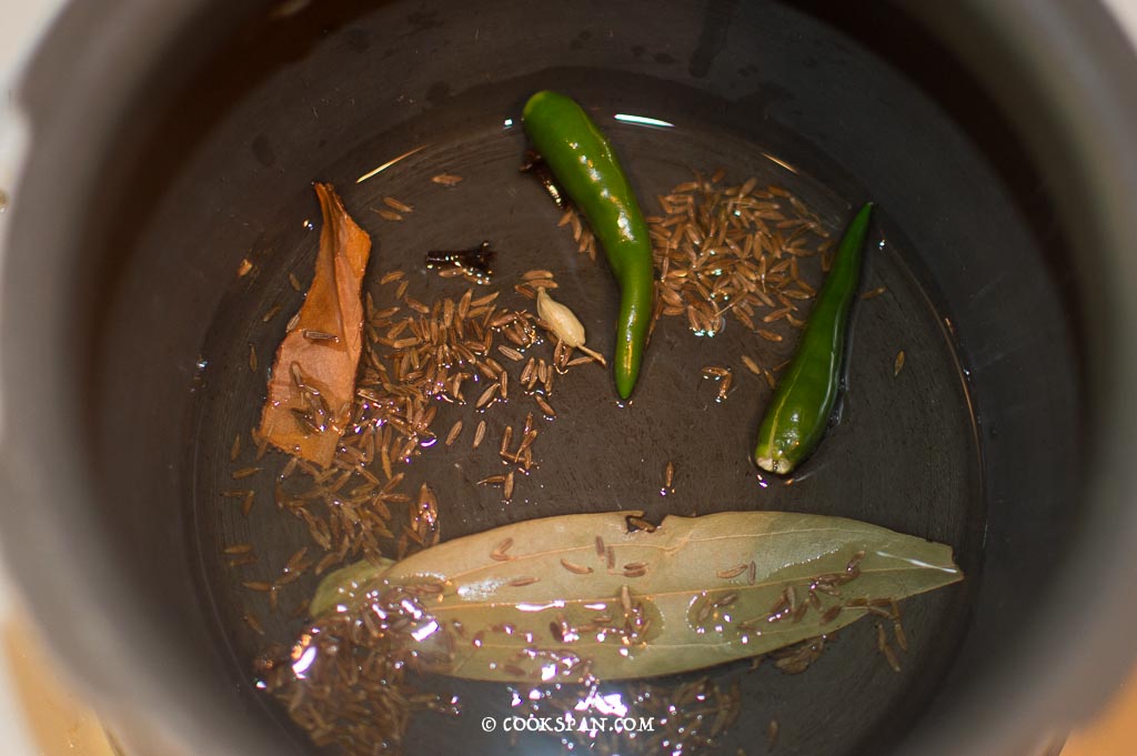 Adding cumin seeds