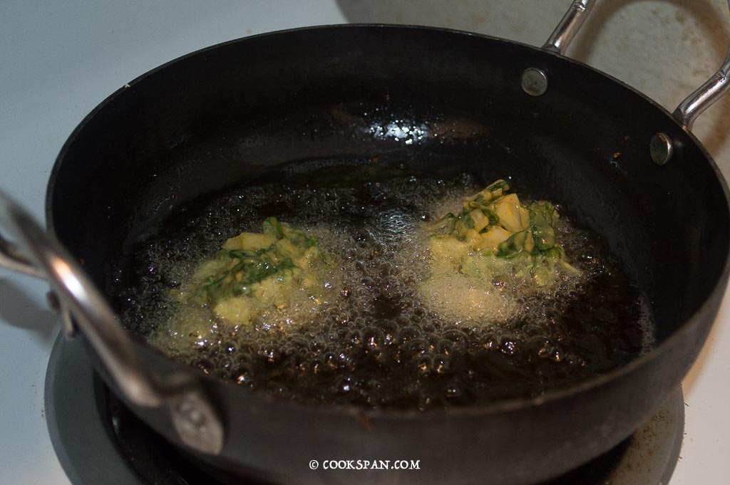 Pouring the Pakodas batter