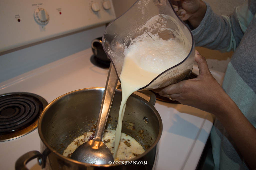 Adding of the blended curd and gram flour