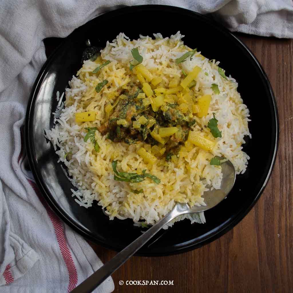 Kadhi Pakoda served on top of the hot rice