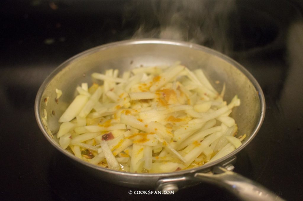 Adding turmeric and salt
