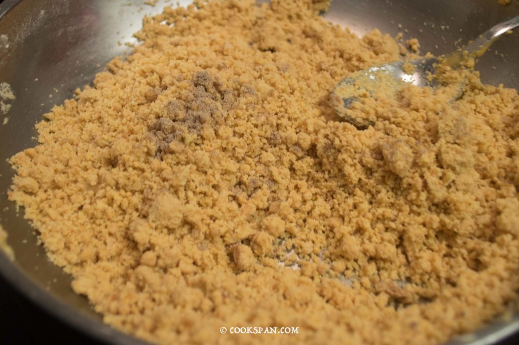 Adding crushed Cardamom