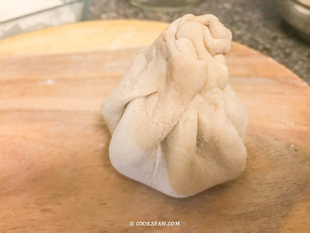 Pinching off the excess dough