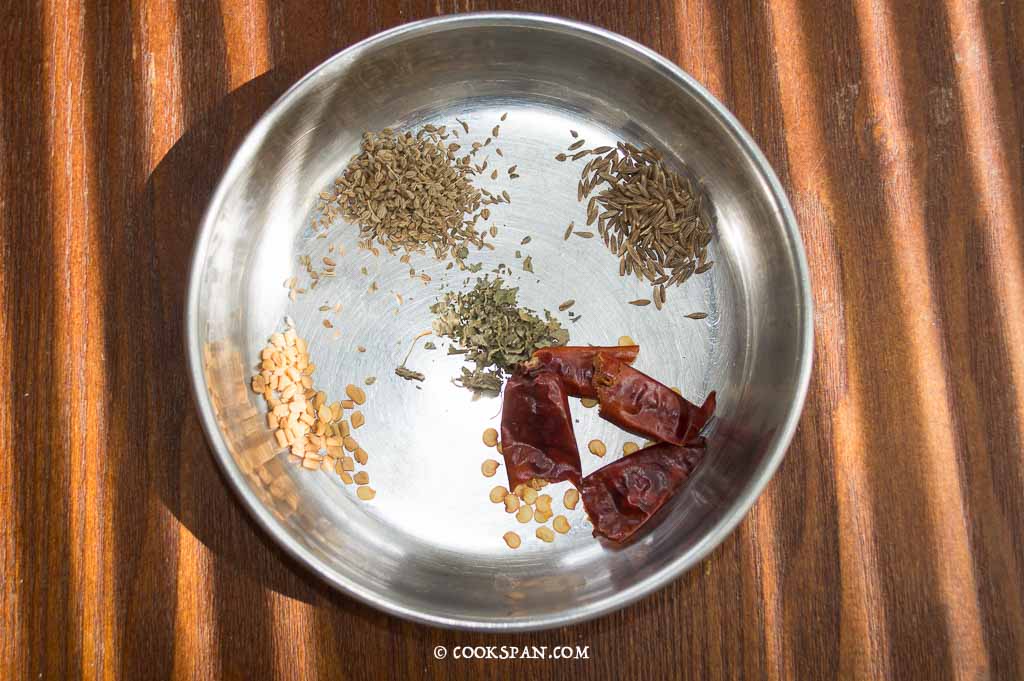 Whole spices to flavor the Kadhi cumin seeds, carom seeds, fenugreek seeds. kasuri methi and red chilies