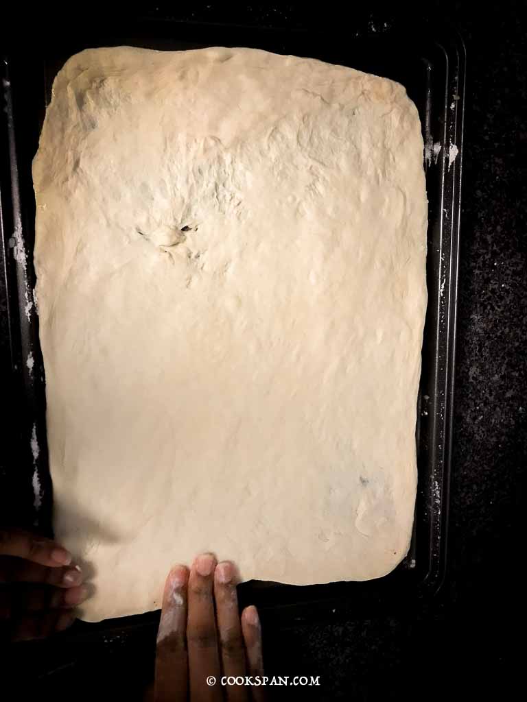 Placing the dough in the baking sheet