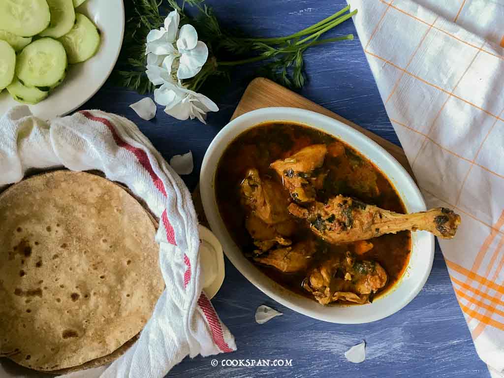 Chicken curry with ghee smeared rotis