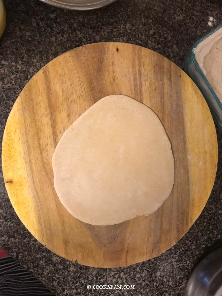 Rolling the dough to a small circle